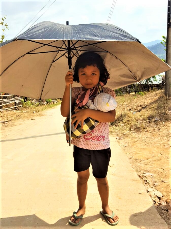little girl with baby