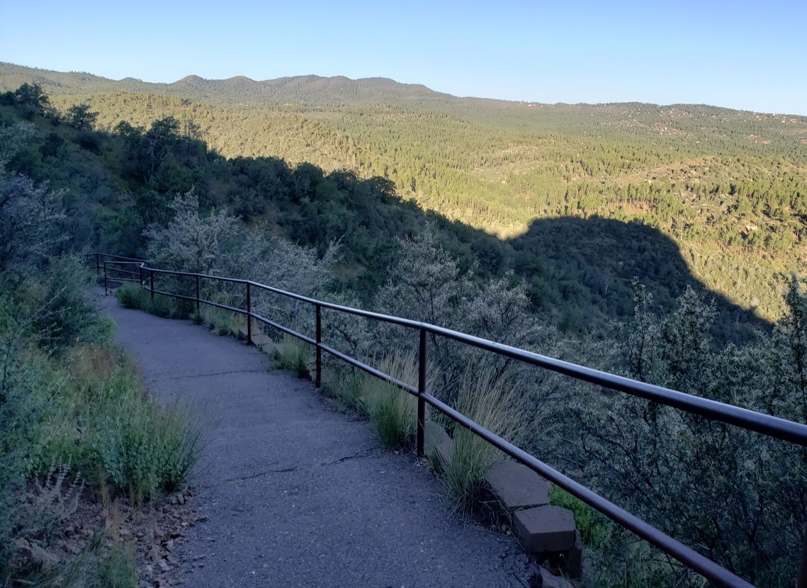 paved trail and thumb shadow